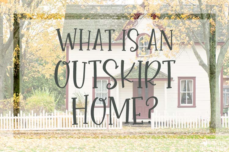 A cute white farmhouse on the outskirts of a country town What is an outskirt home?