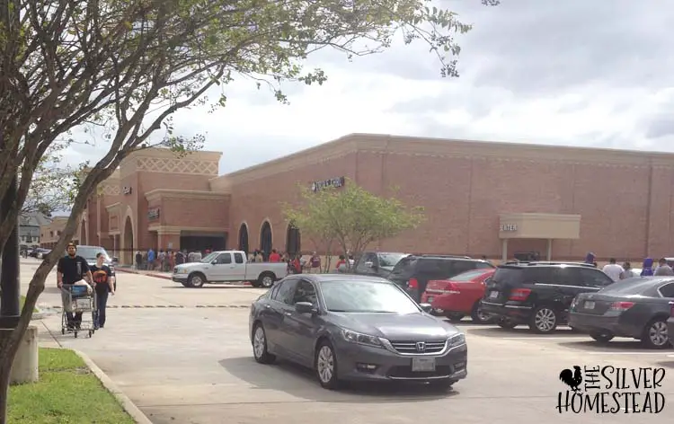 long grocery store lines outside around the block after natural disaster hurricane harvey