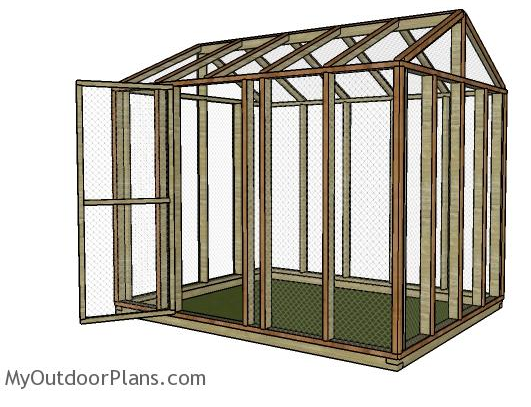 an 8 by 10 foot aviary made of wood and hardware cloth with a peaked roof that can be a stand alone pen
