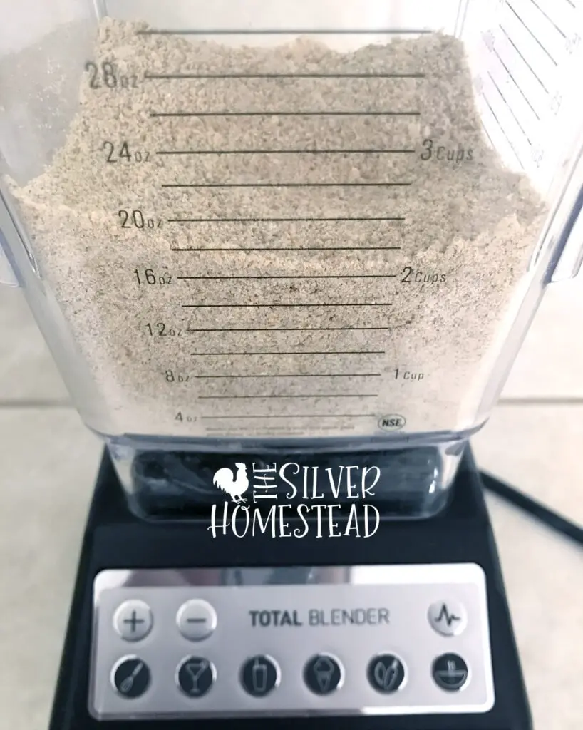 powdered game bird feed in a blender to illustrate How to Make Powdered Game Bird Feed for Coturnix and Button Quail Chicks
